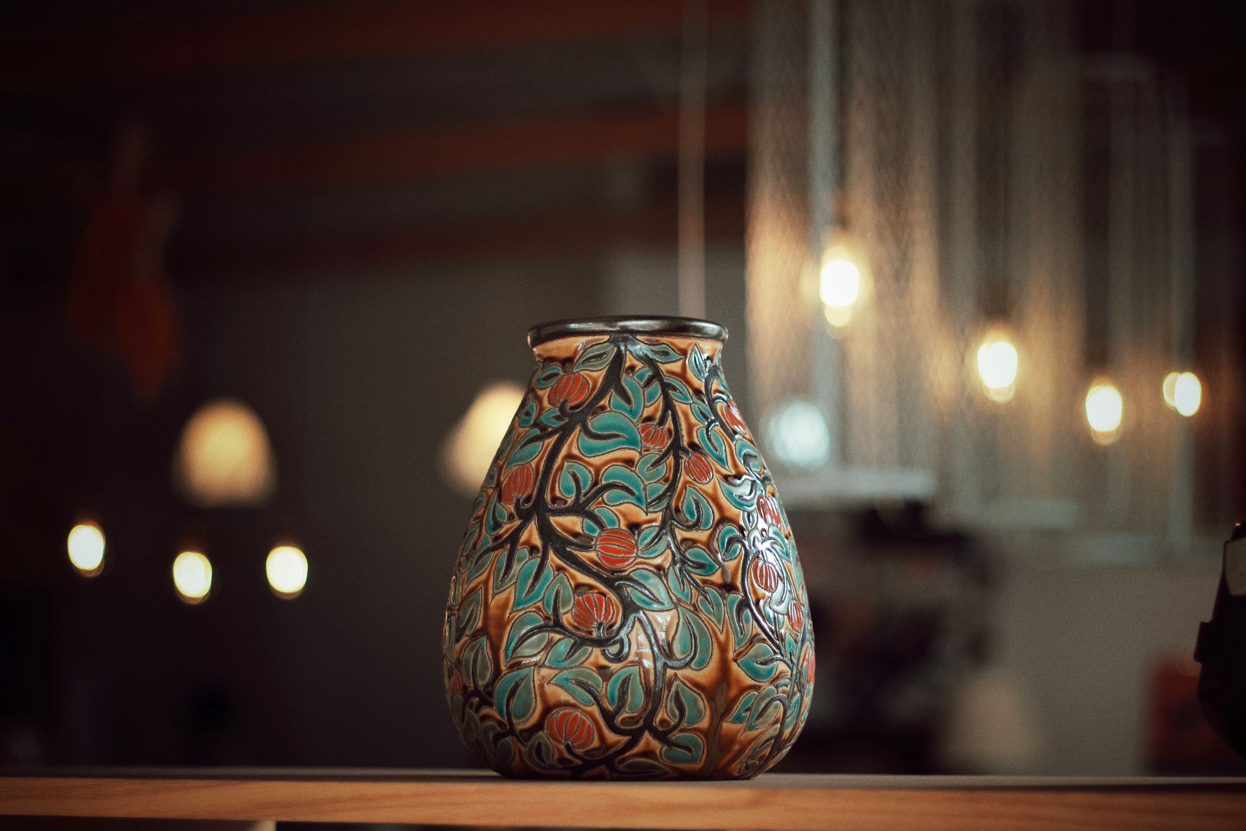 Round vase with greenery